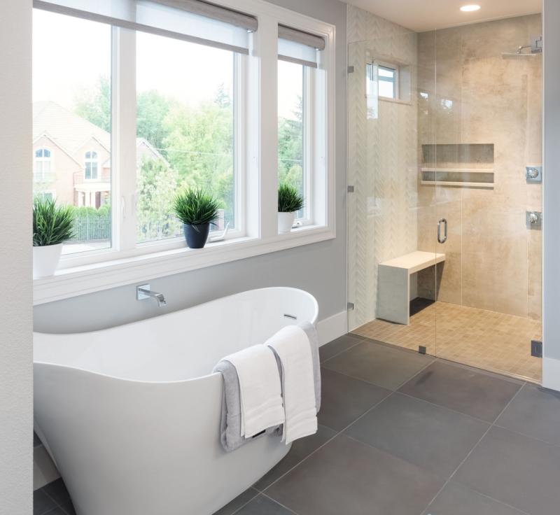 47256762-bathroom-interior-bathtub-and-shower-in-new-luxury-home-stock-photo